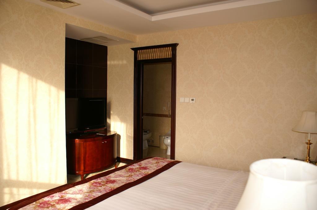 Weigela Park Hotel Dalian Quarto foto